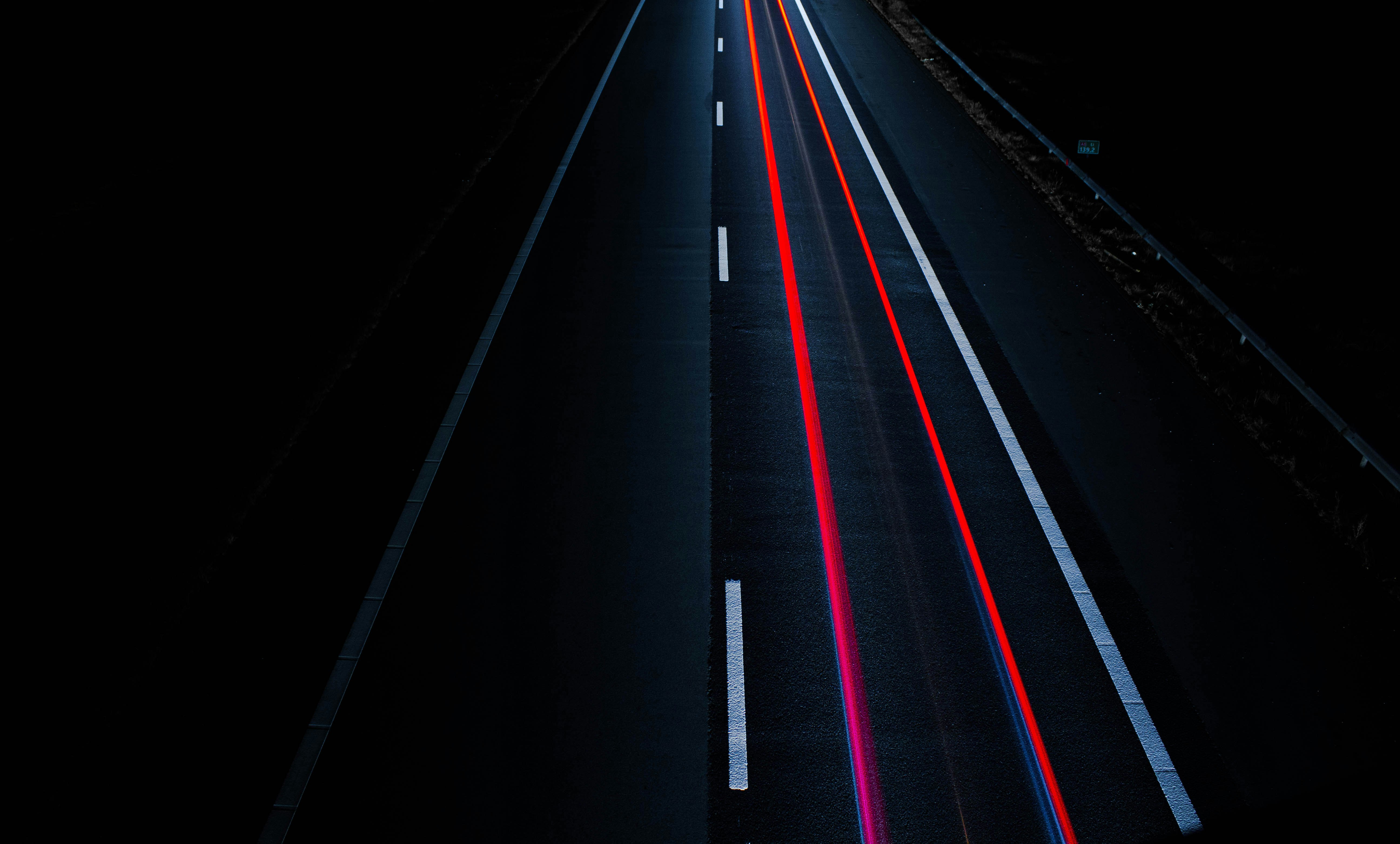 asphalt road with red line